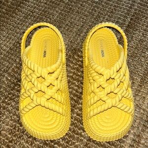 Vibrant Yellow Sandals with Textured Soles and Slingback
